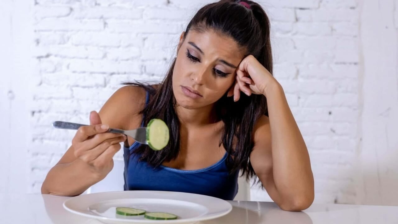 why am i gaining weight in a calorie deficit