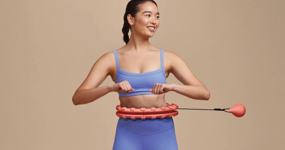 hula hooping with a weighted hoop